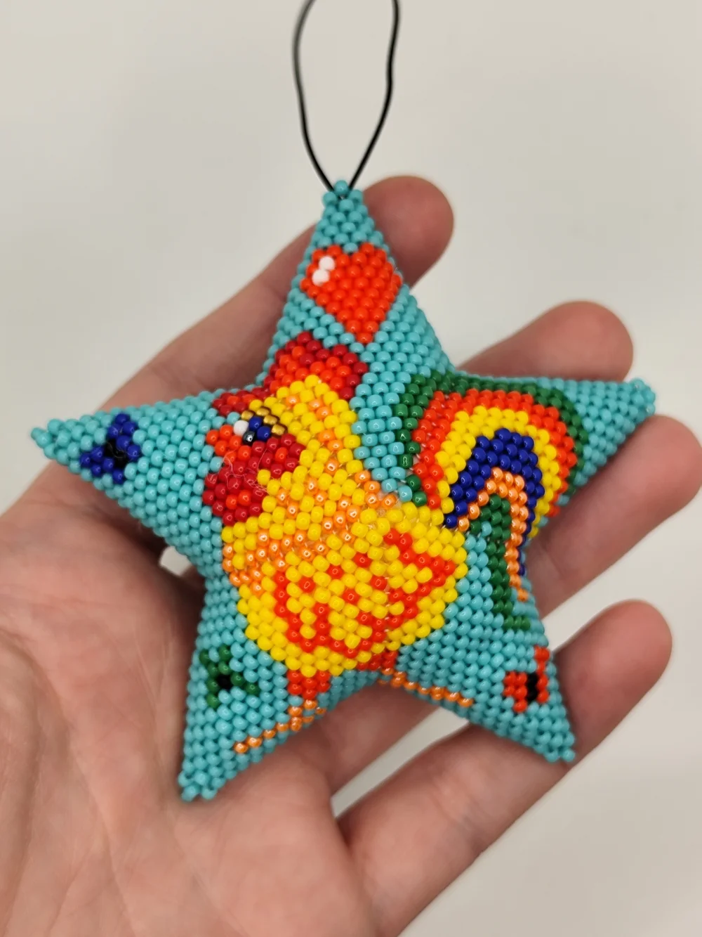 Handcrafted Turquoise Star Bird Ornament with Gold Chicken Design